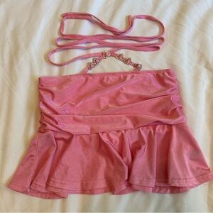 Light pink mini skirt with ruffles